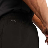 Short Largo Puma para Hombre Train All Day Essential Big Logo 7in Woven Short Negro